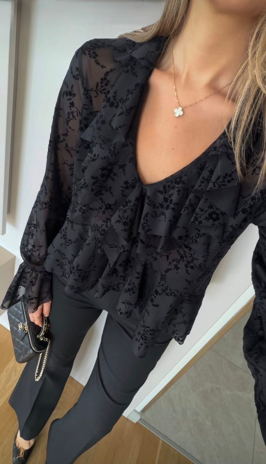 1ac72202-b0e8-4eea-8a4f-1bc862c968a0 Black Sheer Floral Ruffle Blouse - Image 1