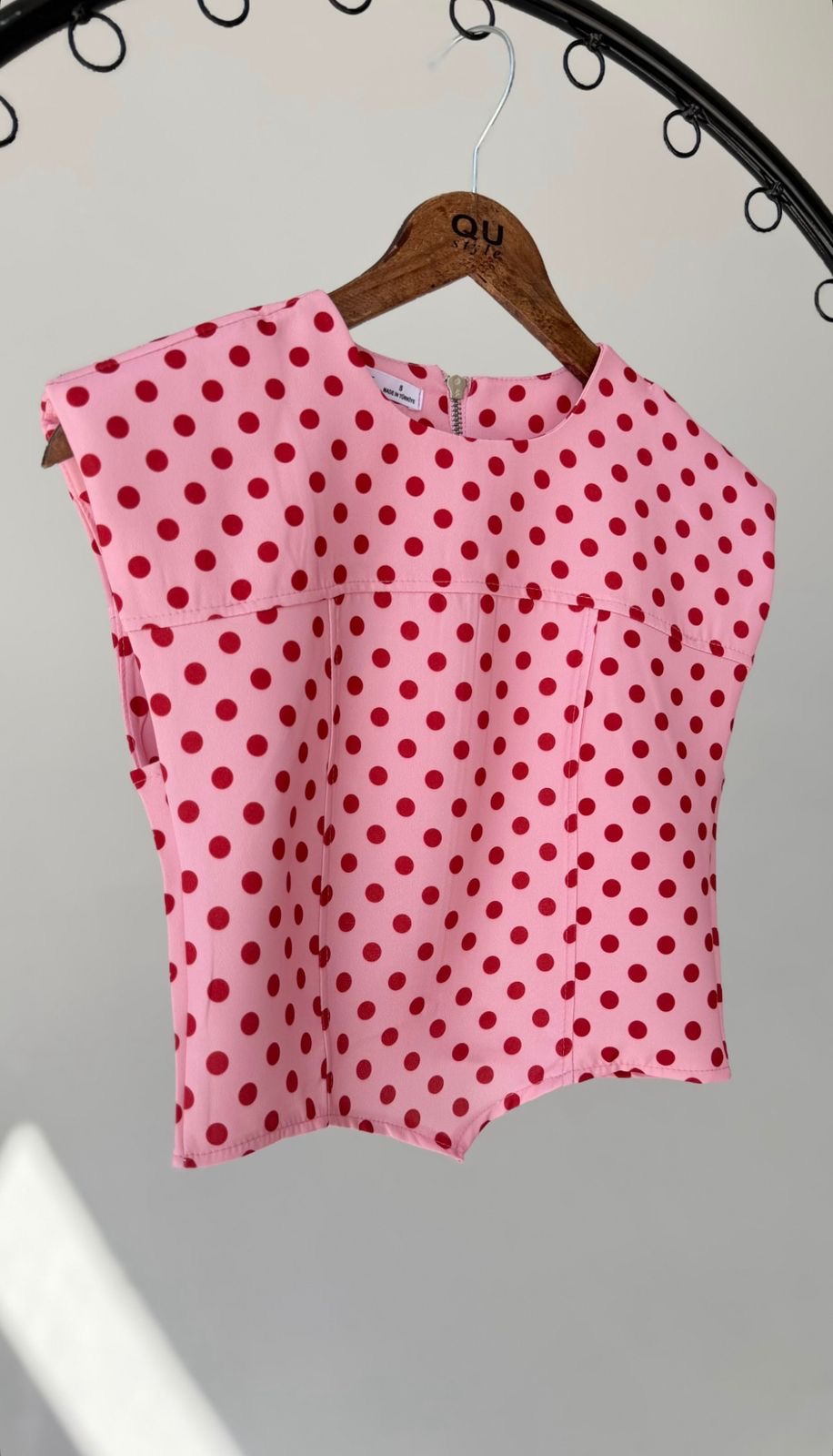 ded1d586-a281-4144-bef7-84c6ae33f5fb Pink Polka Dot Sleeveless Top - Image 1