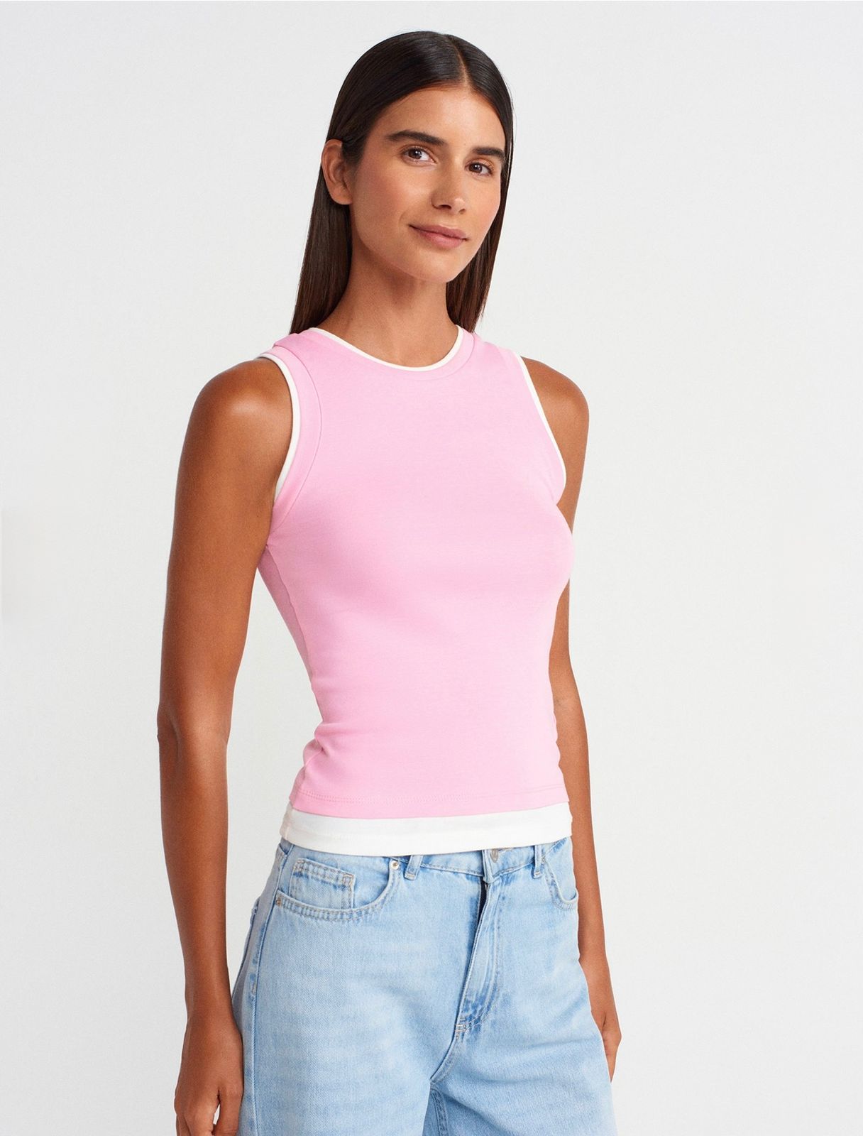 157f8f49-7271-48a0-ba75-229872a968d8.jpeg Pink Sleeveless Tank Top - Image 1