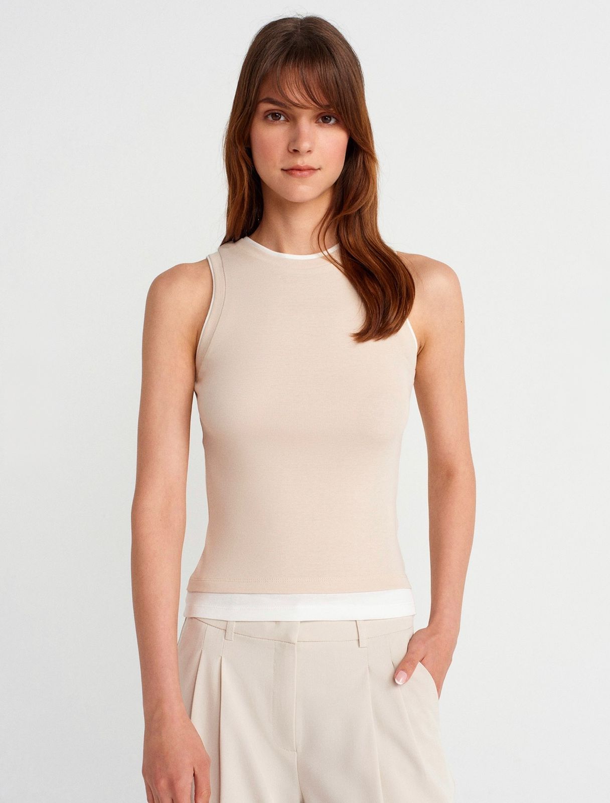 353bc831-5f94-4125-b742-f81d84575af6.jpeg Beige Sleeveless Tank Top - Image 1